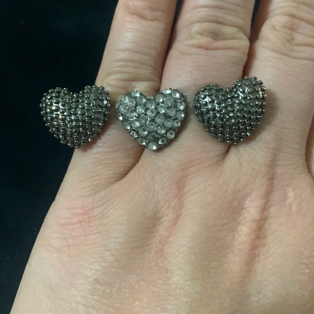 Two finger ring with heart design